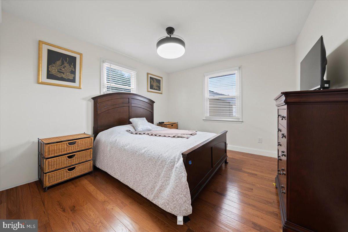 484 Centerton Road Bridgeton, NJ 08302 - Photo 15 of 49 a bedroom with a bed and a flat screen tv