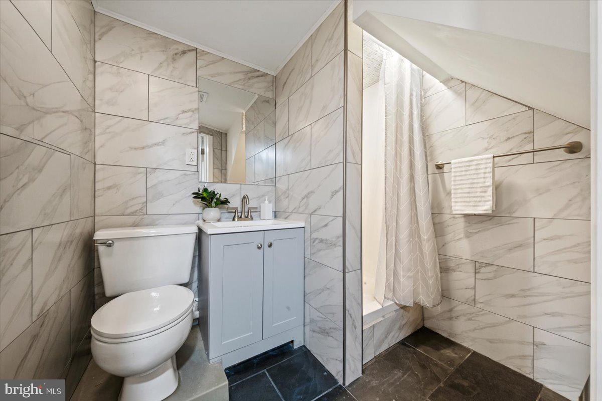 484 Centerton Road Bridgeton, NJ 08302 - Photo 21 of 49 a bathroom with a toilet and a shower