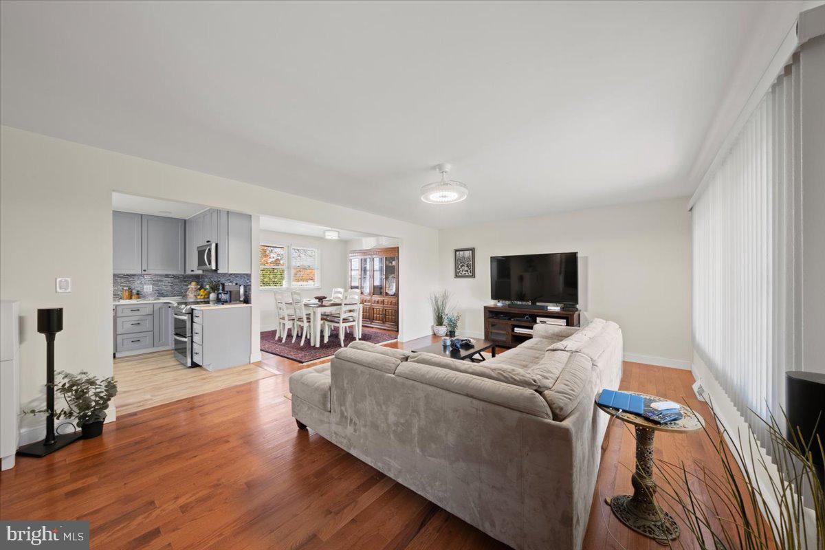 484 Centerton Road Bridgeton, NJ 08302 - Photo 5 of 49 a living room with furniture and a flat screen tv