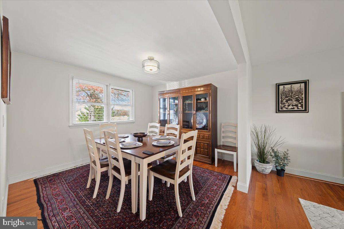 484 Centerton Road Bridgeton, NJ 08302 - Photo 6 of 49 a view of a dining room with furniture window and wooden floor