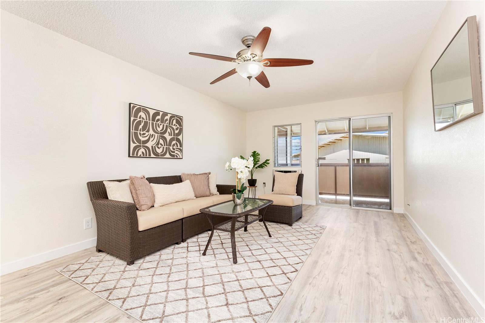 a living room with furniture and a window