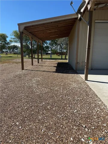 a view of back yard of the house