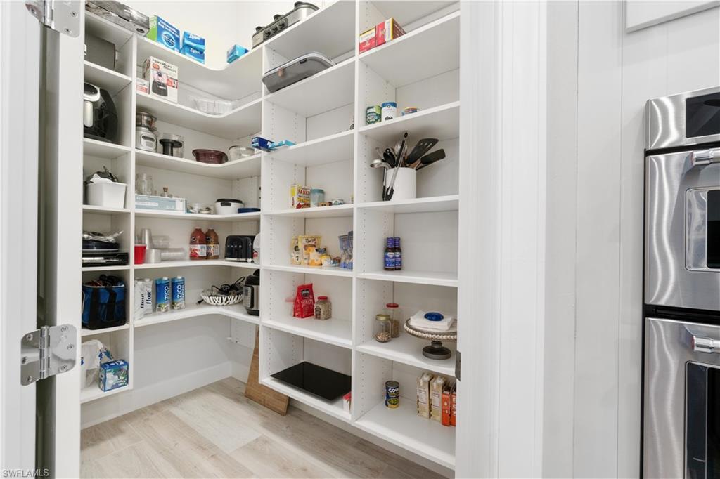 14367 Pine Hollow Drive Estero, FL 33928 - Photo 16 of 50 a room with storage and utility