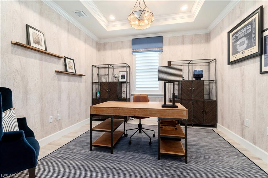 14367 Pine Hollow Drive Estero, FL 33928 - Photo 17 of 50 a room with furniture and wooden floor