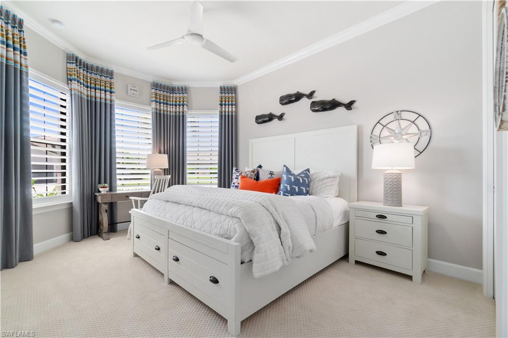 14367 Pine Hollow Drive Estero, FL 33928 - Photo 20 of 50 a bed room with a bed and a large window
