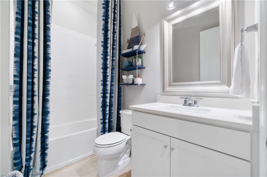 14367 Pine Hollow Drive Estero, FL 33928 - Photo 21 of 50 a bathroom with a sink a toilet and shower
