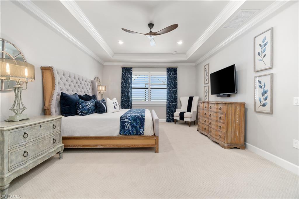 14367 Pine Hollow Drive Estero, FL 33928 - Photo 23 of 50 a living room with furniture and a flat screen tv