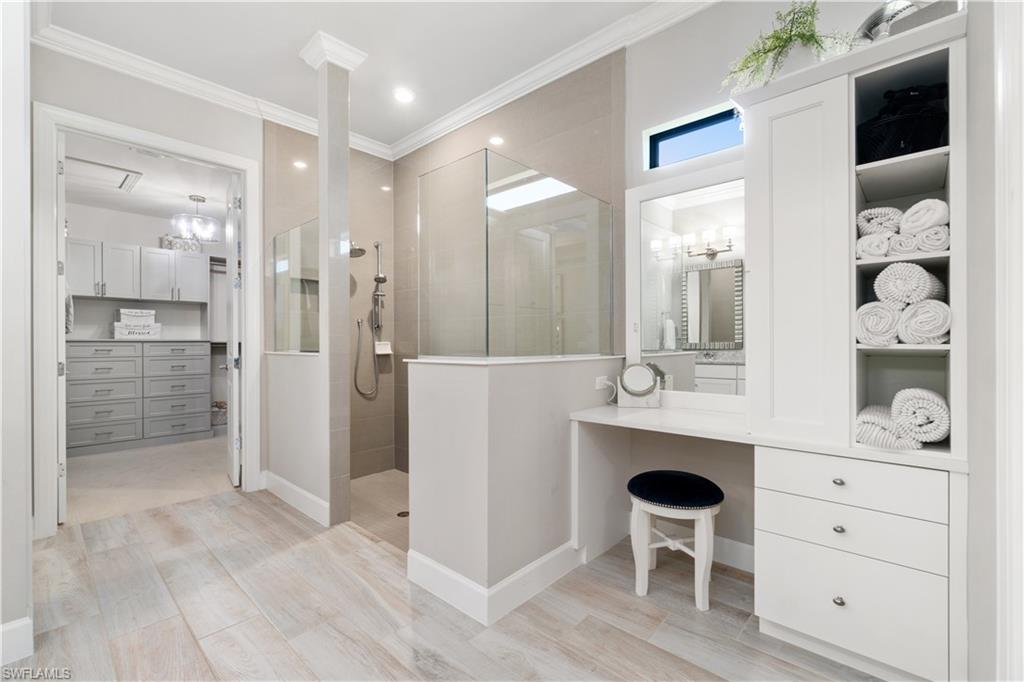 14367 Pine Hollow Drive Estero, FL 33928 - Photo 25 of 50 a bathroom with a sink and a mirror