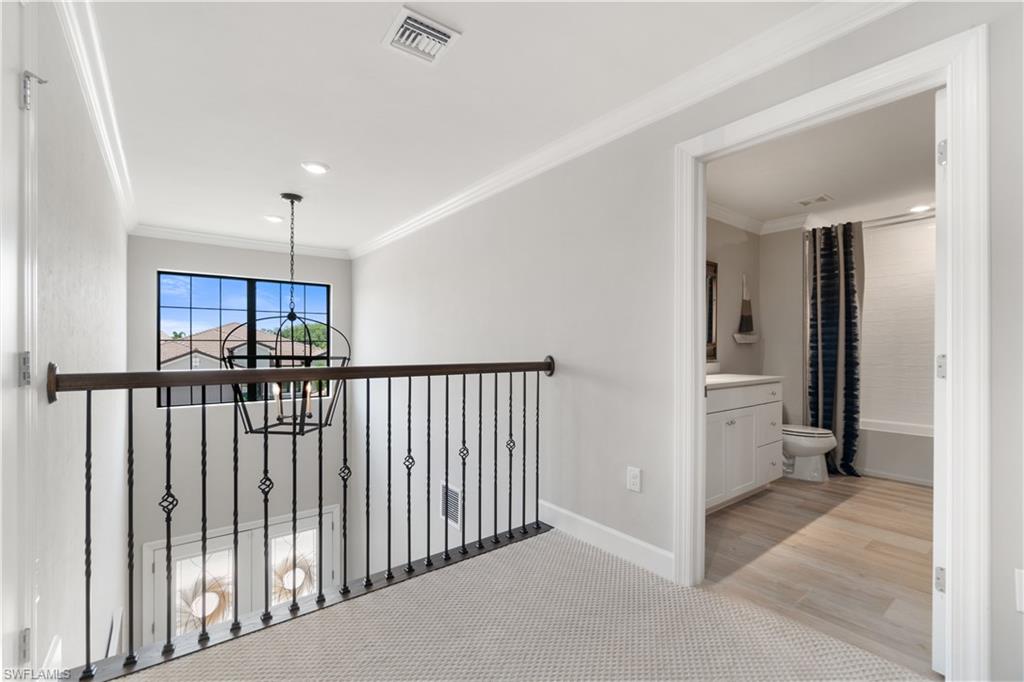 14367 Pine Hollow Drive Estero, FL 33928 - Photo 28 of 50 a view of a hallway with a closet in a living room