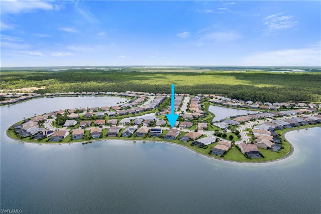 14367 Pine Hollow Drive Estero, FL 33928 - Photo 46 of 50 a view of a lake with outdoor space