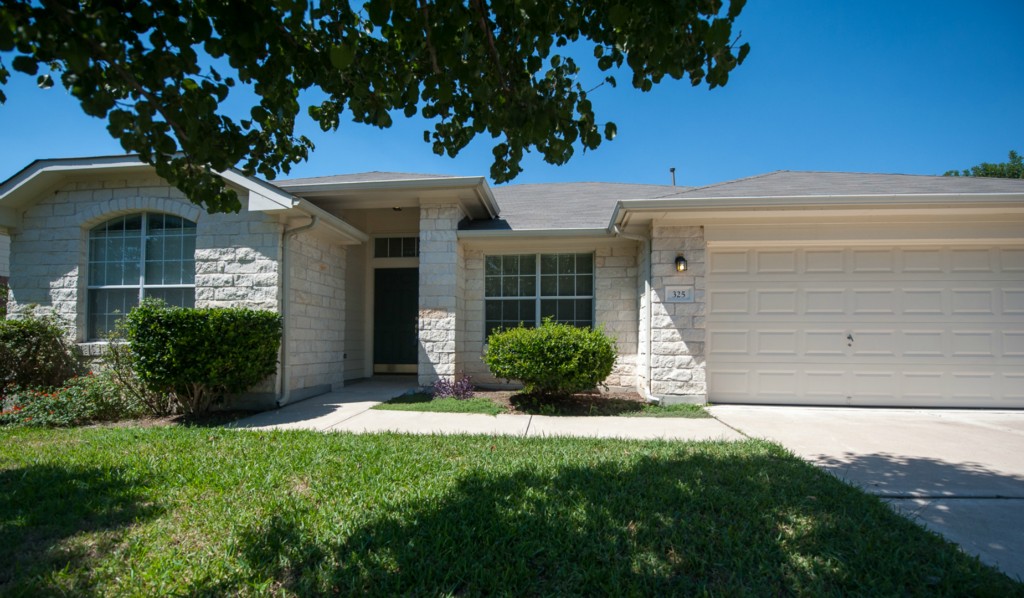 325 Ranier Lane Round Rock, TX 78665 - Photo 1 of 1 a view of house with a yard