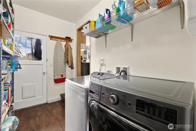 a utility room with dryer and washer