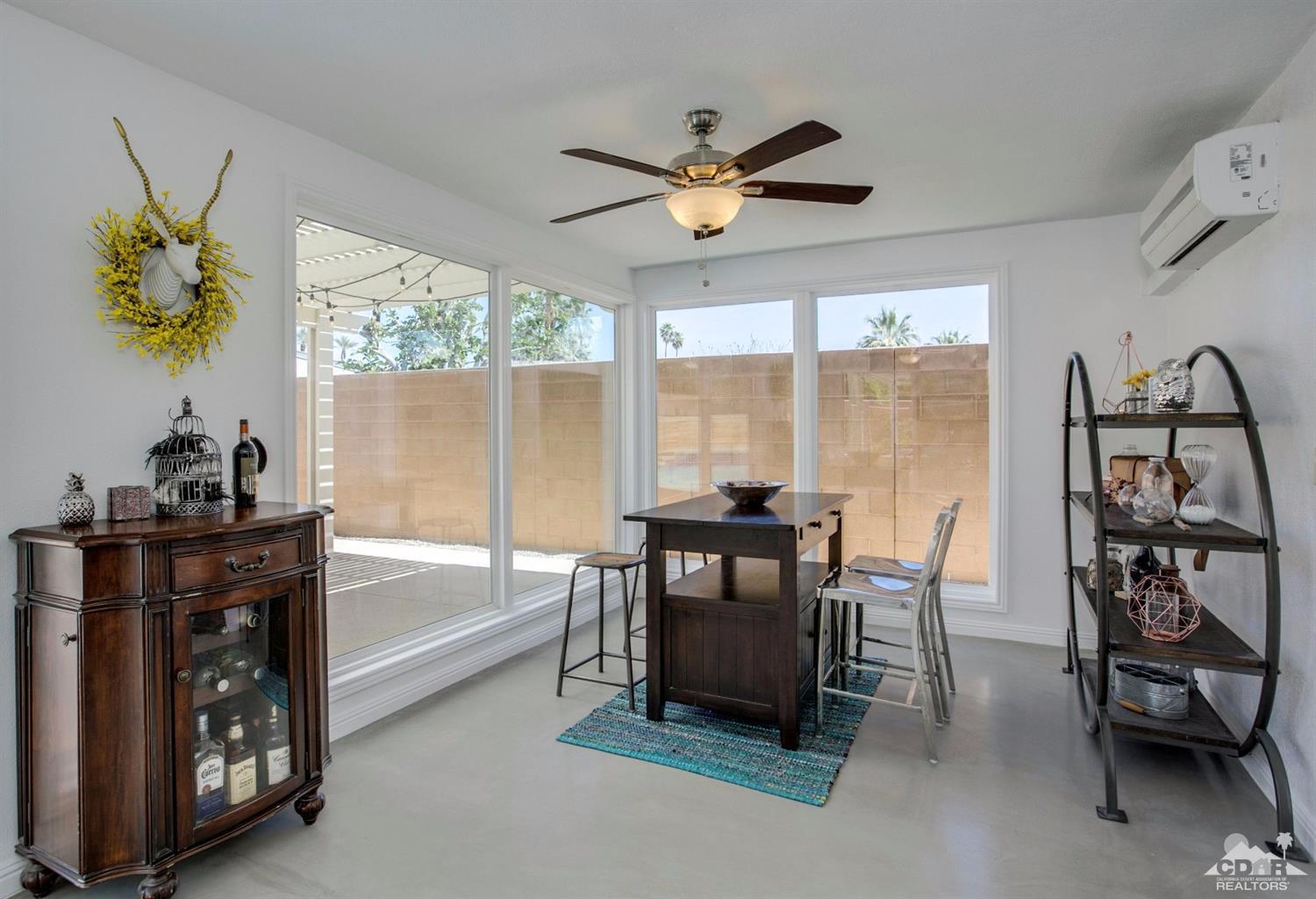 70070 Chappel Road Rancho Mirage, CA 92270 - Photo 12 of 32 a view of a dining room with furniture window and outside view