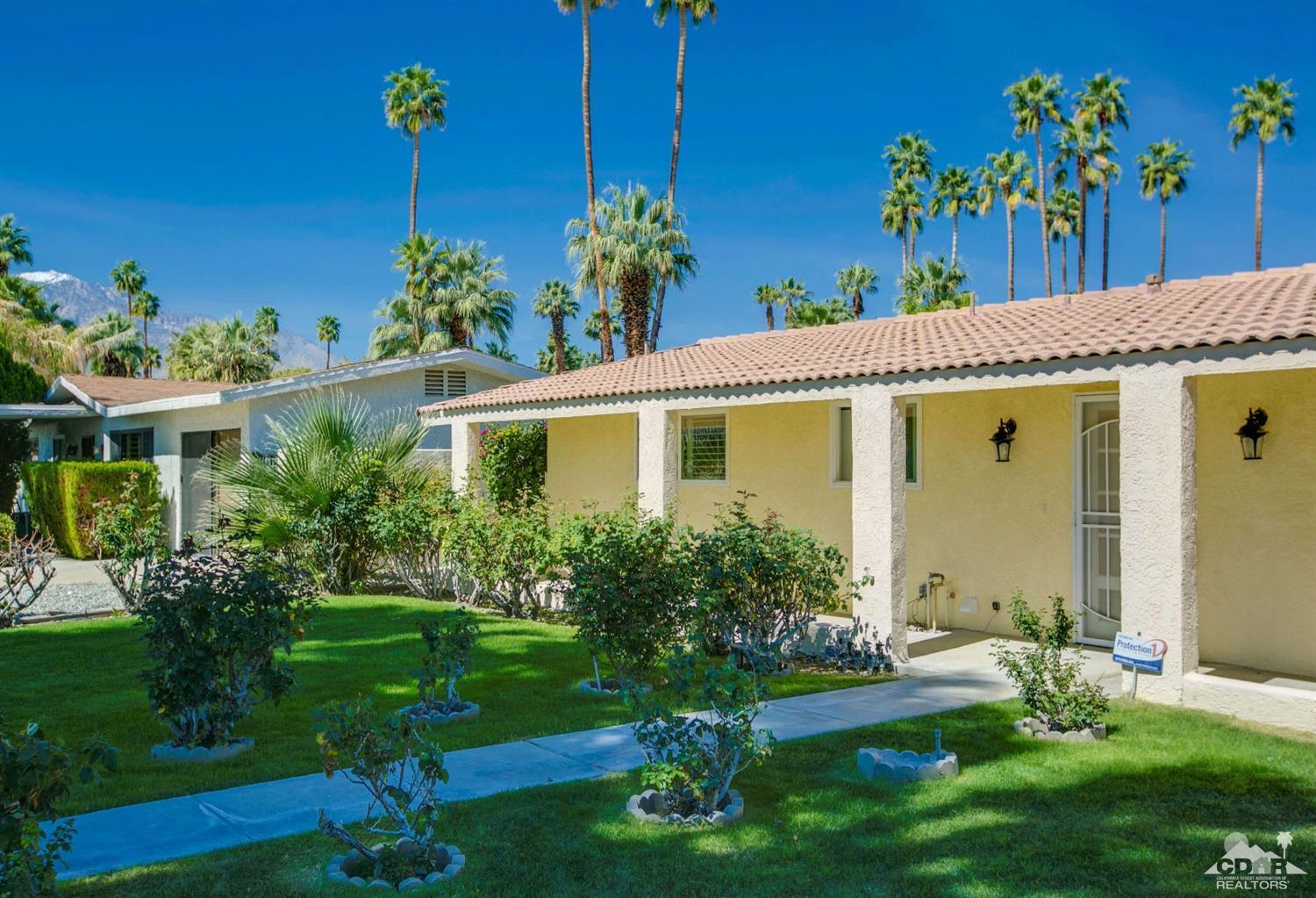 70070 Chappel Road Rancho Mirage, CA 92270 - Photo 31 of 32 a front view of a house with a yard