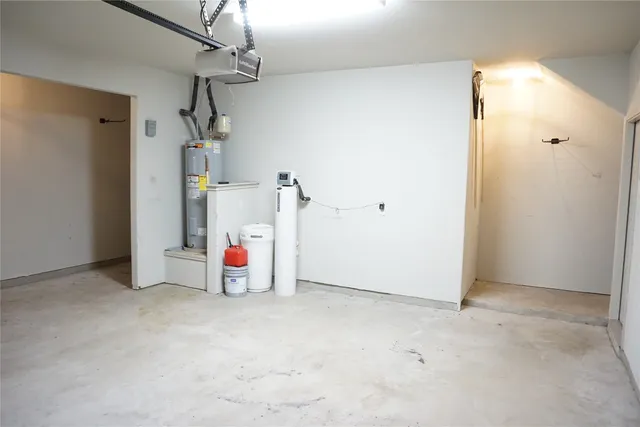 a view of a room with air conditioner duct and materials on floor