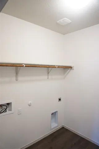 a view of a room with racks on the wall