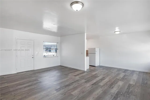 a view of kitchen with wooden floor