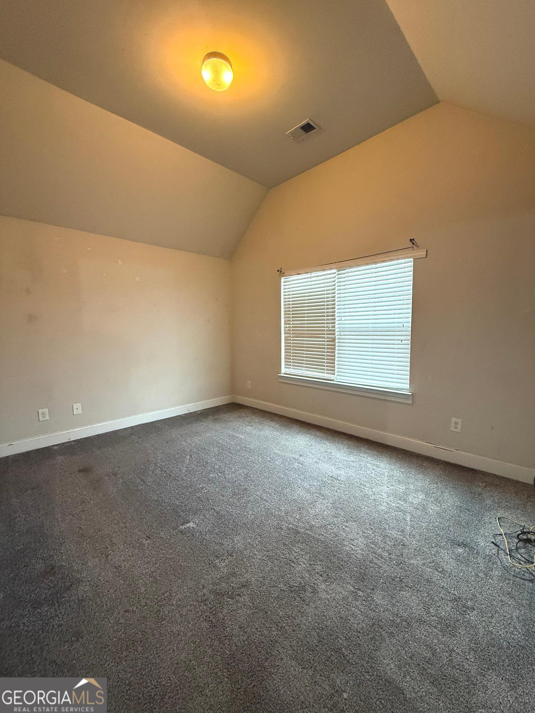 9159 Dover Street Lithia Springs, GA 30122 - Photo 12 of 23 an empty room with a window