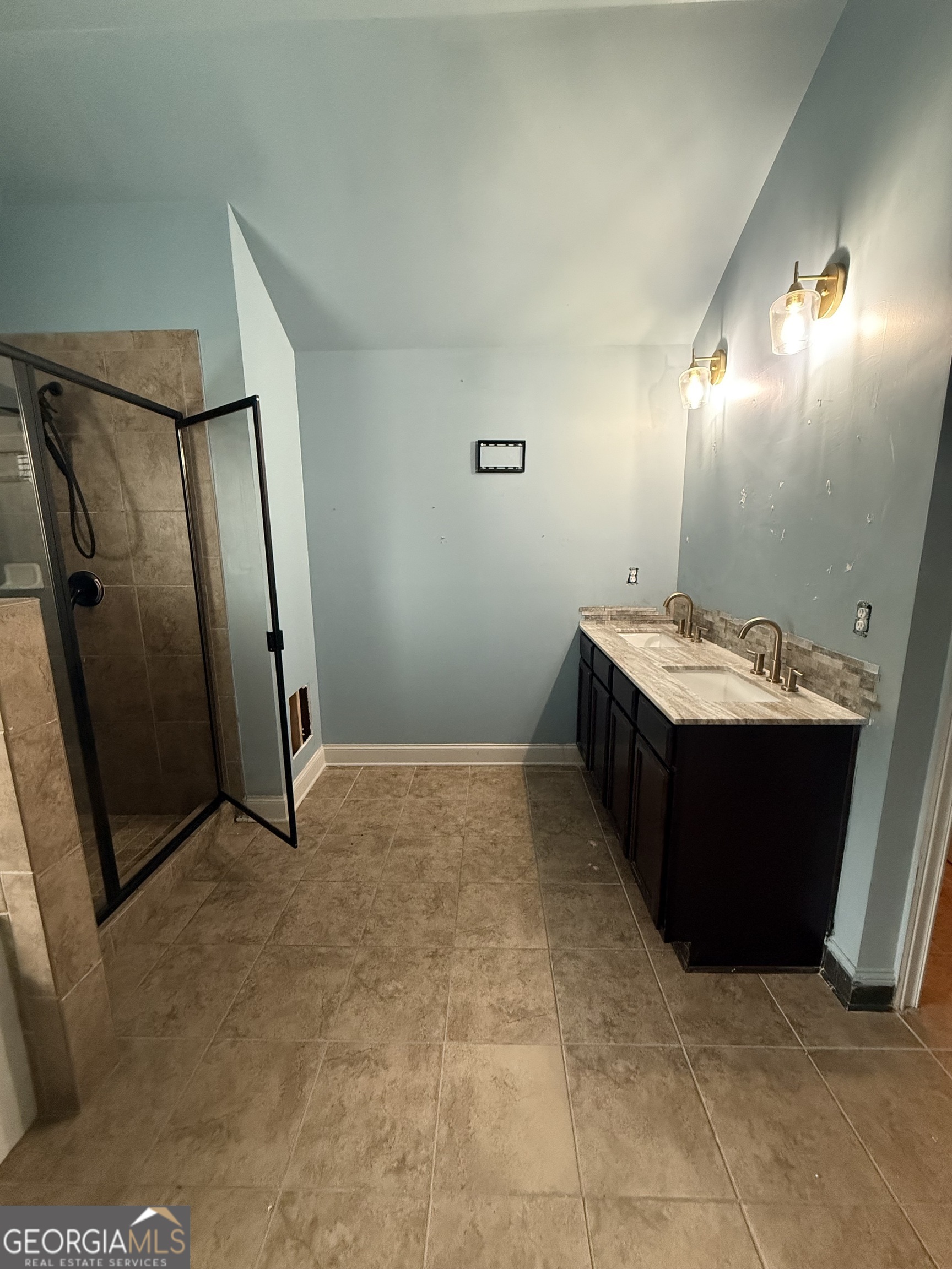 9159 Dover Street Lithia Springs, GA 30122 - Photo 7 of 23 a bathroom with a sink and mirror