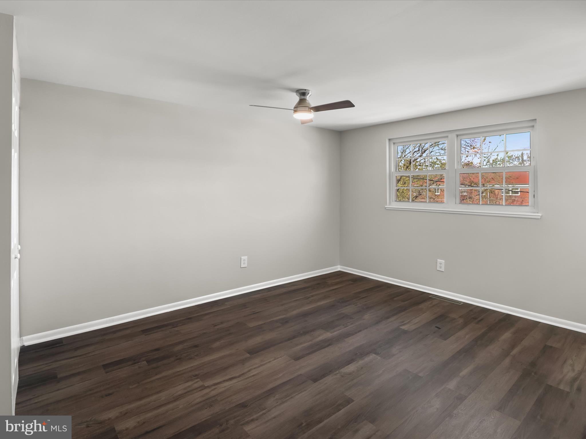 1026 Circle Drive Halethorpe, MD 21227 - Photo 21 of 37 wooden floor in an empty room with a window