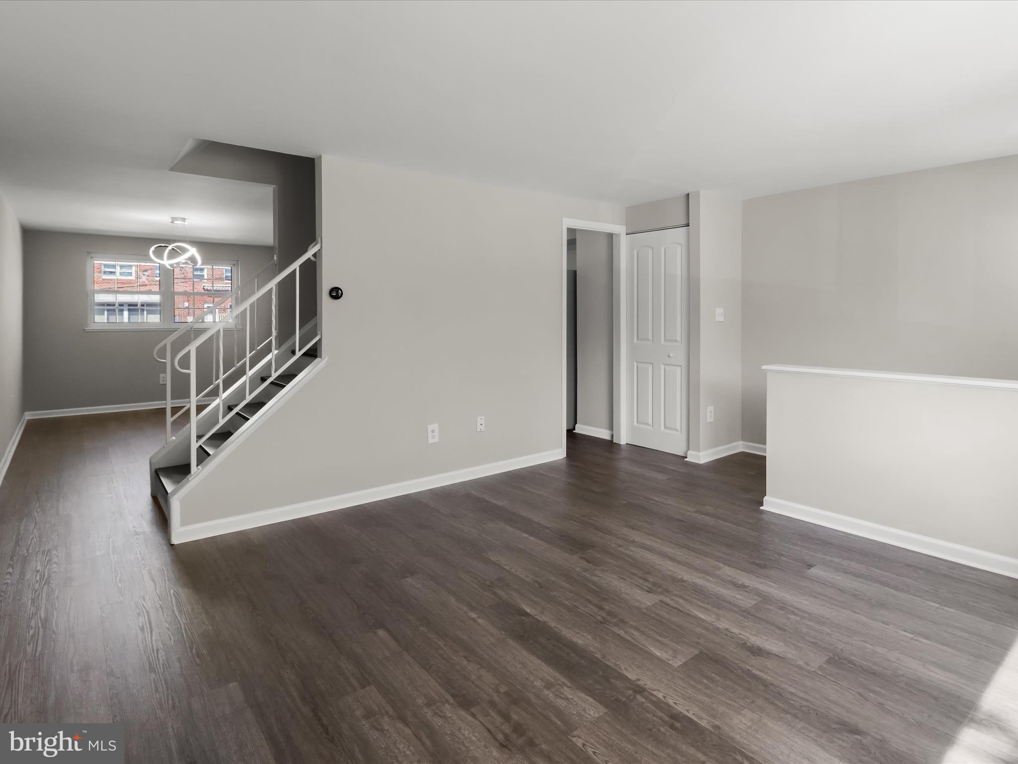 1026 Circle Drive Halethorpe, MD 21227 - Photo 10 of 37 a view of an empty room with wooden floor and stairs