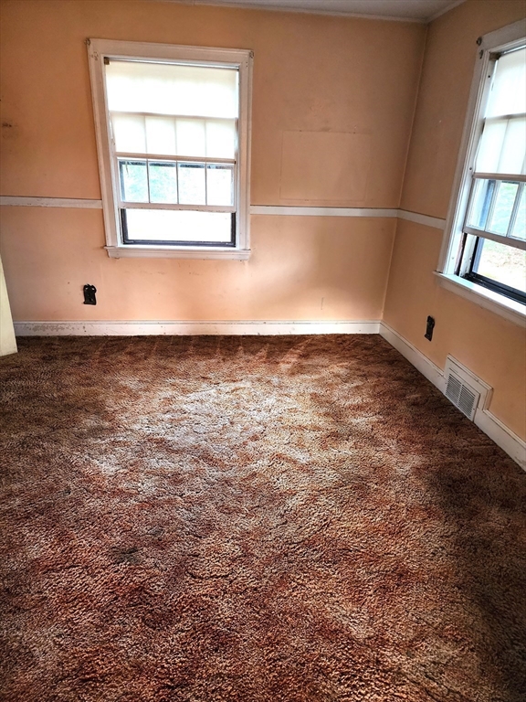 92 Lexington Road Billerica, MA 01821 - Photo 3 of 10 an empty room with a window