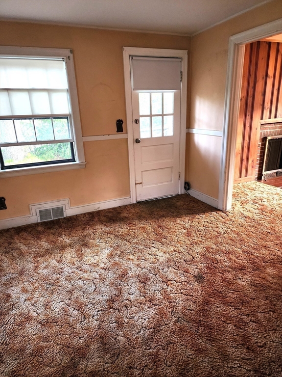 92 Lexington Road Billerica, MA 01821 - Photo 4 of 10 an empty room with windows