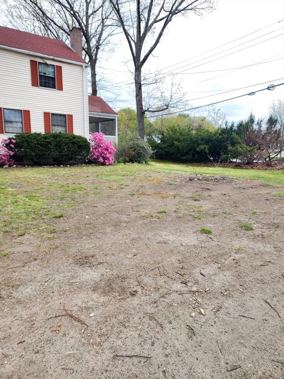 92 Lexington Road Billerica, MA 01821 - Photo 8 of 10 a front view of a house with garden