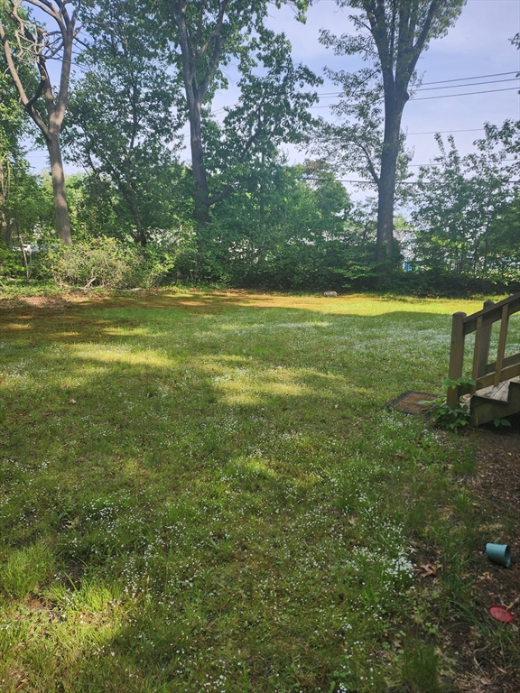 92 Lexington Road Billerica, MA 01821 - Photo 10 of 10 a view of yard with swimming pool and green space
