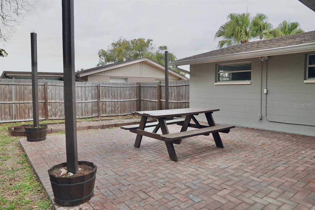 7944 Yucca Drive New Port Richey, FL 34653 - Photo 17 of 26 a house view with a garden space