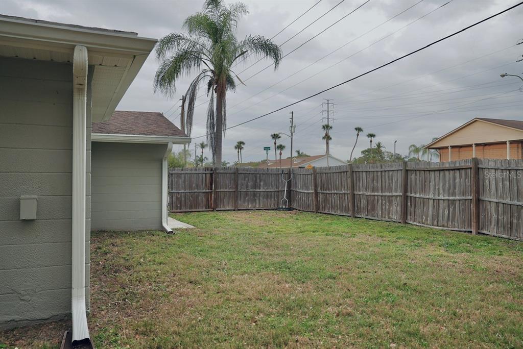 7944 Yucca Drive New Port Richey, FL 34653 - Photo 19 of 26 a view of a backyard