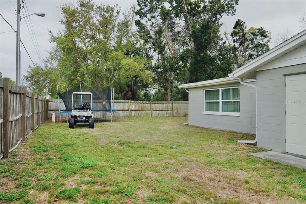 7944 Yucca Drive New Port Richey, FL 34653 - Photo 21 of 26 a view of a house with backyard