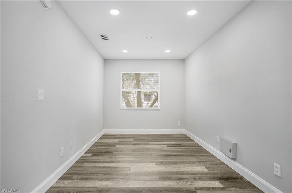 209 Robin Hood Circle, Unit 5201 Naples, FL 34104 - Photo 9 of 30 a view of an empty room