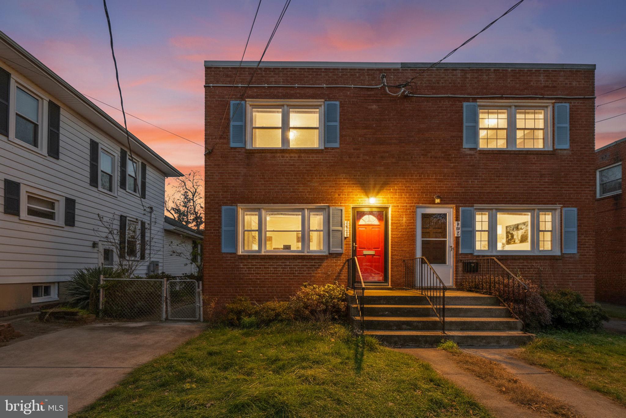 107 East Del Ray Avenue Alexandria, VA 22301 - Photo 1 of 30 a front view of a house