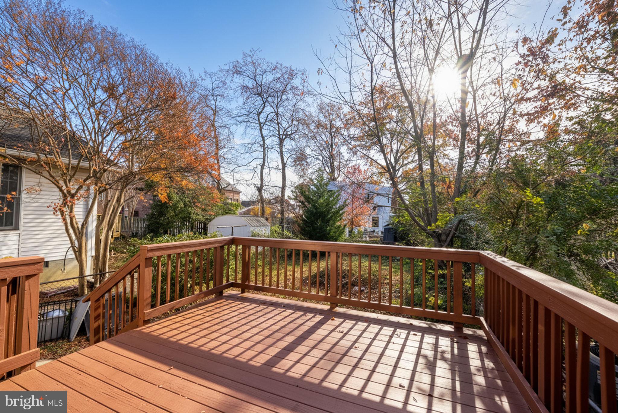 107 East Del Ray Avenue Alexandria, VA 22301 - Photo 12 of 30 a view of deck with wooden floor and fence