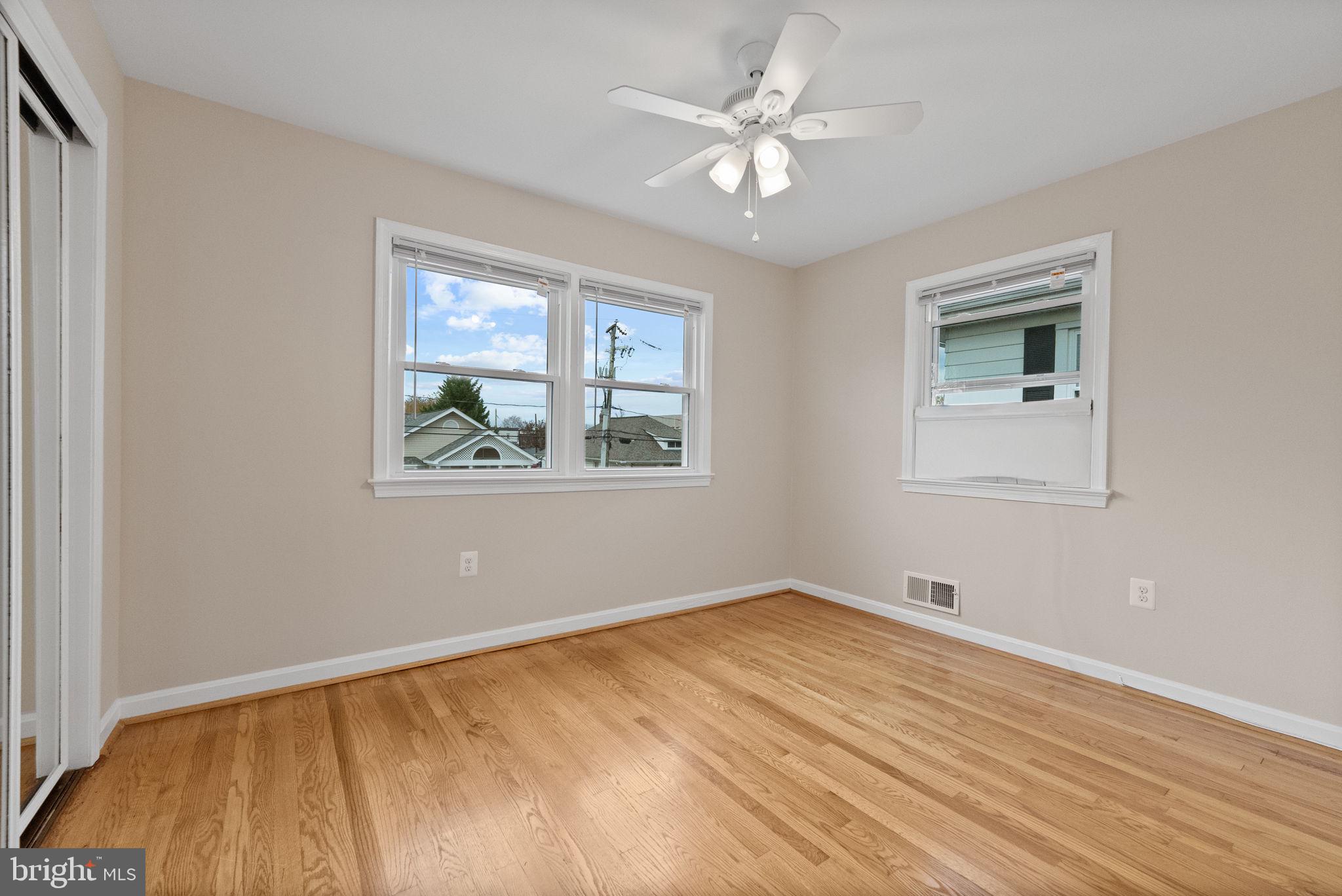 107 East Del Ray Avenue Alexandria, VA 22301 - Photo 18 of 30 a view of an empty room with window