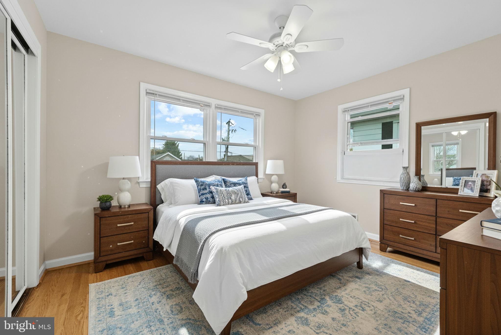 107 East Del Ray Avenue Alexandria, VA 22301 - Photo 5 of 30 a bedroom with a bed and a dresser