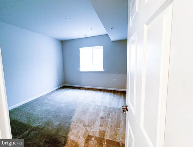 a bathroom with a double vanity sink toilet and shower