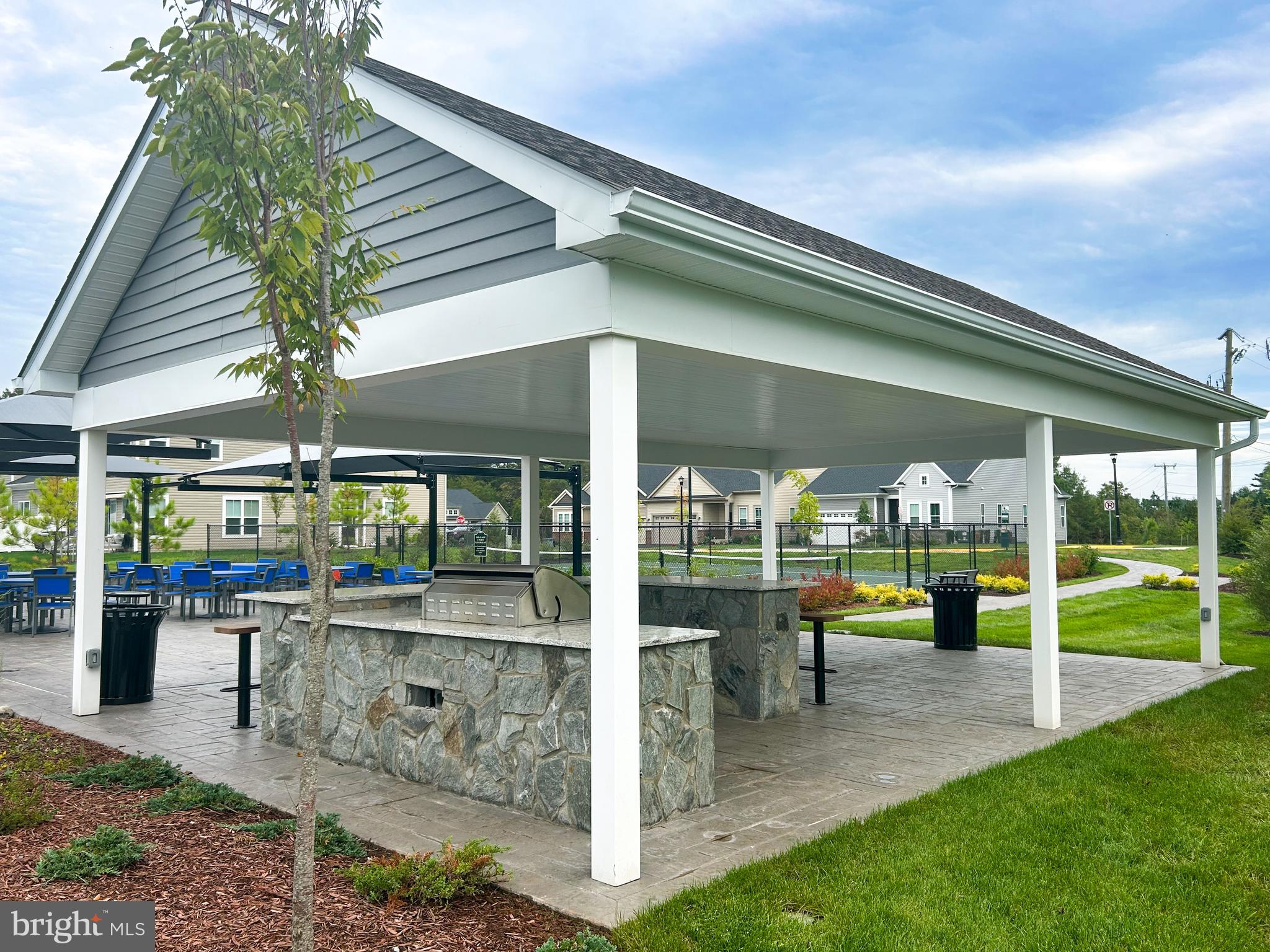 9204 Crestview Rdg Drive Bristow, VA 20136 - Photo 19 of 30 a view of a swimming pool with a patio