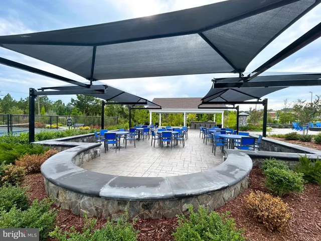 a view of swimming pool from a balcony