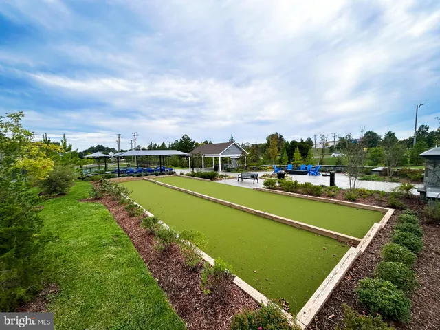 a view of multiple houses with yard