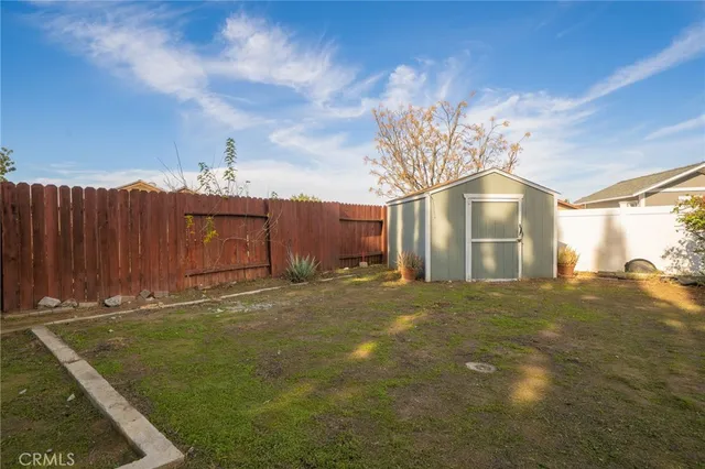 a big yard with table and chairs
