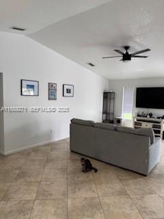 13060 Southwest 263rd Terrace Homestead, FL 33032 - Photo 27 of 30 a living room with furniture and a flat screen tv