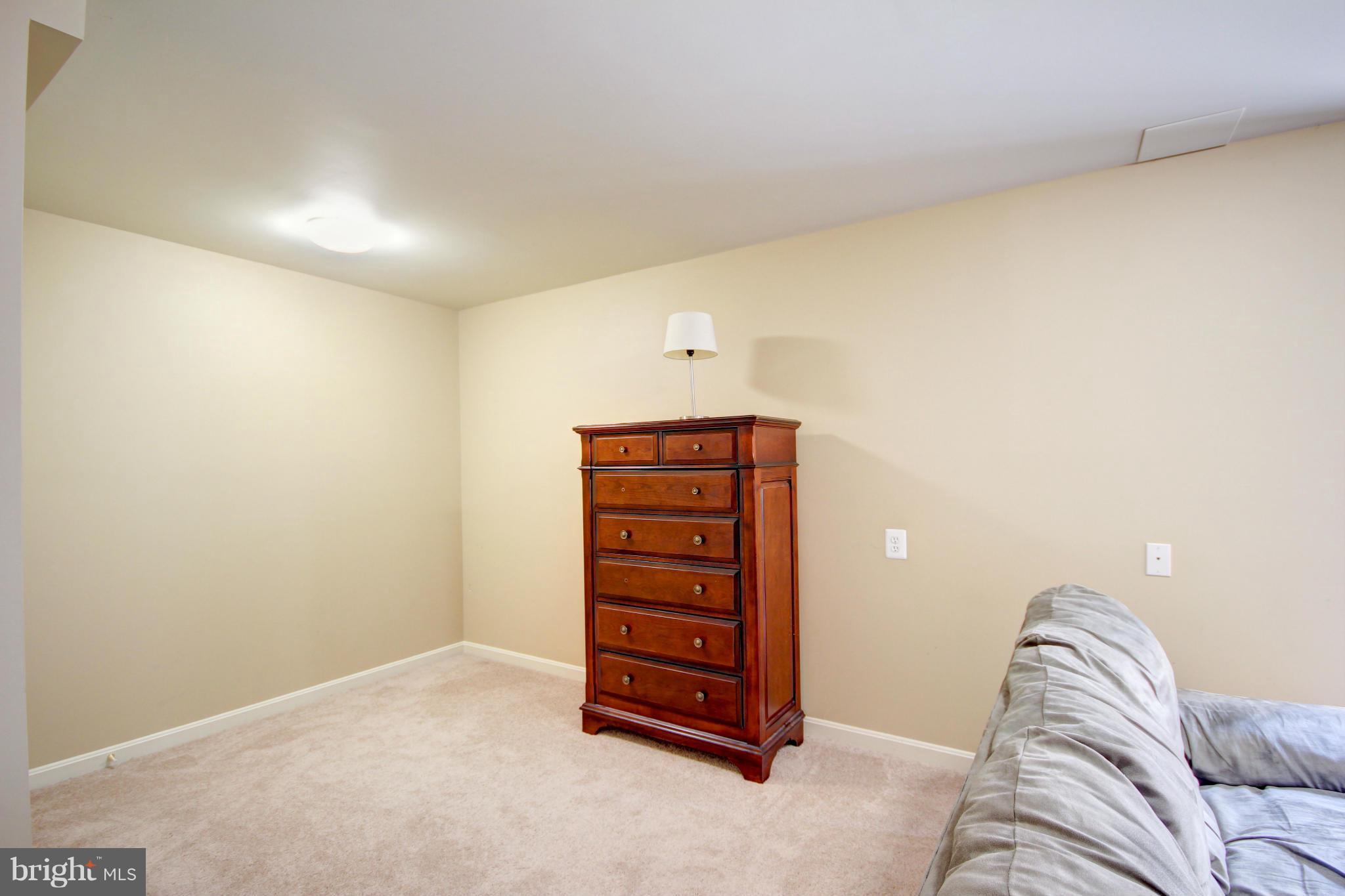 209 Byfield Road Westminster, MD 21157 - Photo 22 of 30 Game area in finished basement