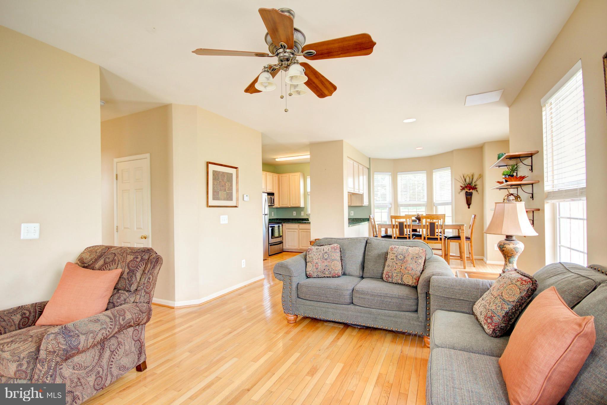 209 Byfield Road Westminster, MD 21157 - Photo 9 of 30 Full shot, family room, dining and kitchen