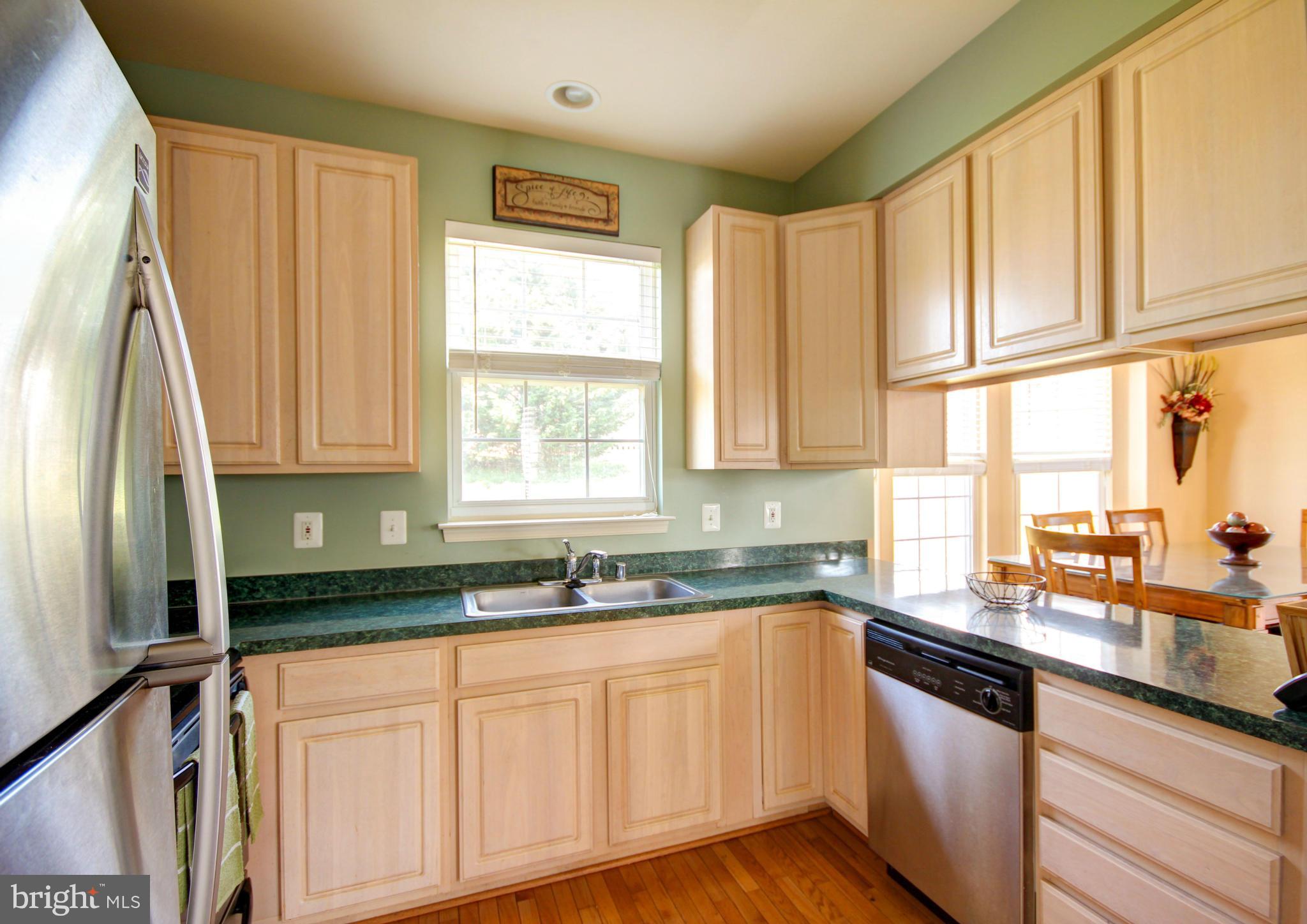 209 Byfield Road Westminster, MD 21157 - Photo 10 of 30 Breakfast bar opening to dining room