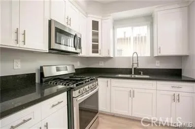 a bathroom with a bathtub and a toilet