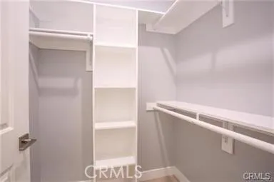 a kitchen with stainless steel appliances cabinets a microwave and a refrigerator