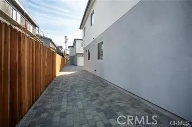 a view of backyard with large tree