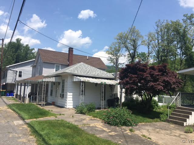 643 Slateford Road Mount Bethel, PA 18343 - Photo 1 of 15 a front view of a house with yard and green space